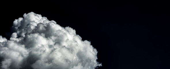 Artistic photo of sky with clouds in black and white colors, abstract background