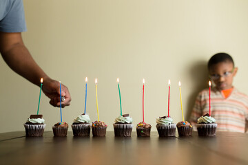 Man lights nine birthday candles