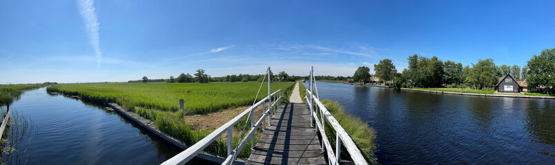 Fototapeta na wymiar Panorama from a bridge over a canal in Kalenberg