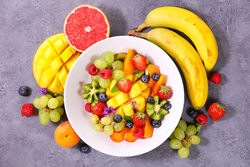 Fototapeta na wymiar fresh fruit salad- top view