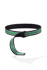 Subject shot of striped canvas belt with D-rings buckle and lettering NICE. Stylish black, white and green belt is isolated on the white background.