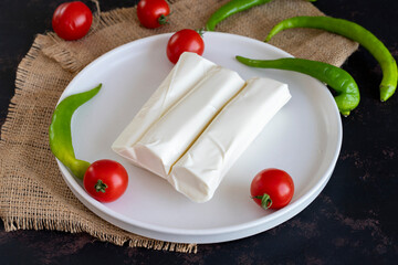 string cheese on a dark background