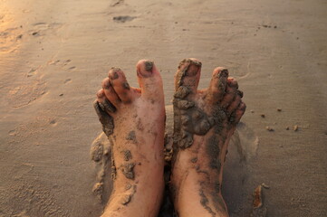 feet on the beach