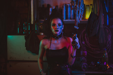 Cyberpunk cosplay. A girl with makeup and hair styling in a futuristic steampunk style