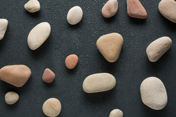 colorful sea  pebbles with water drops