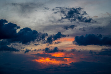 Colorful dramatic sky with beautiful cloud at sundown