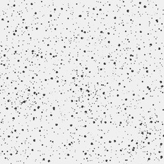 Abstract modern graphic background with random scattered dots on white. Artistic backdrop with copy space for design. Web banner. Black stains on light 