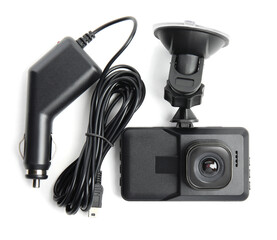 Modern car dashboard camera with suction mount and charger on white background, top view