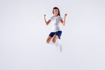 Fototapeta na wymiar Full length body size view of her she nice-looking attractive lovely pretty slim cheerful cheery straight-haired girl jumping rejoicing isolated over light white gray pastel color background