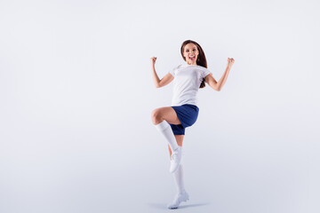 Full length body size view of her she nice attractive lovely slim thin satisfied cheerful cheery straight-haired girl jumping having fun rejoicing isolated on light white gray pastel color background