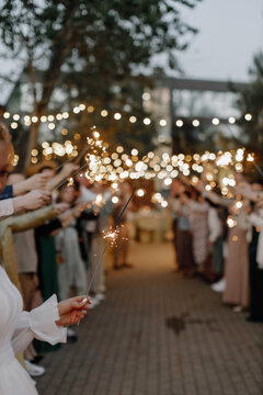 Bangal lights in the hands of people at the event