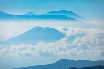 Silhouette of Mount Argopuro, and landscape of the massive volcanic complex of East Java province,...