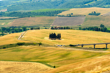 Italy Tuscany trekking along the Val d'Orcia, view of the panorama and San Quirico d'Orcia.