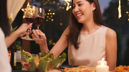 Asian couple celebrate birthday party with cake together at home. LGBTQ lover have a romantic moments together. Same-sex marriage and LGBT couple relationship concept.