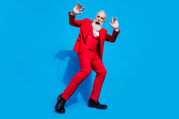 Full size photo of senior man millionaire happy positive smile have fun dance disco isolated over blue color background