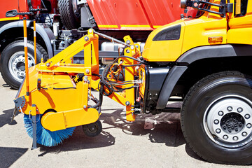 Cleaning truck with attachments sweeping brush