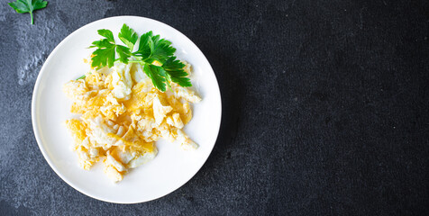 scramble fried egg scrambled breakfast dish on the table healthy food meal snack copy space food background rustic. top view
