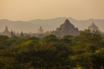 Fototapeta na wymiar Sunset landscape of the ancient Buddhist temples in the city of Bagan, in Myanmar, declared a World Heritage Site by UNESCO