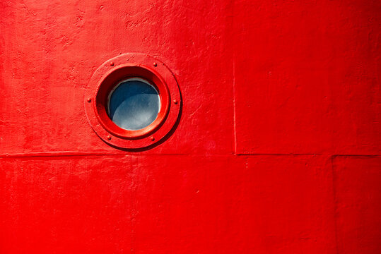 Round Viewing Window In Lighthouse On Vlieland Island In The Netherlands.