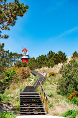 Red lighthouse on a dune at Vlieland island in the Netherlands.