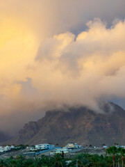 Sunset in South Tenerife mountains on cloudy evening