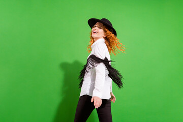 Profile photo of funny orange hairdo millennial lady stand look wear shirt trousers hat isolated on...