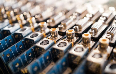 Close-up blurry metal sockets on a computer video board