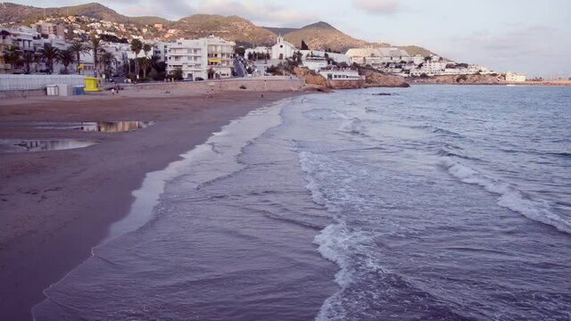 View of the beach of Sitges in the autumn evening