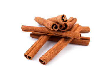 Fragrant cinnamon sticks isolated on white background