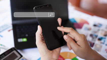 Searching for internet data network concepts web browsing, human hand smartphone to search the internet, search engine with blank search bar, search engine optimization, SEO.