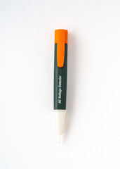 Electric voltage detector isolated on white background.