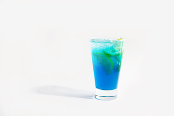 Blue cocktail in a glass with ice and lemon.