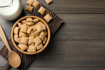 Delicious corn pads served on wooden table, flat lay. Space for text