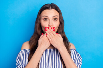 Photo of impressed guilty young lady wear off-shoulders clothes arms cover lips isolated blue color background