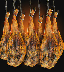 Gastronomía y alimentación en España. Pata entera de varios jamones serranos ibéricos...