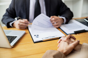 Successful job interview, Recruiter or manager and job candidate with resume in office.