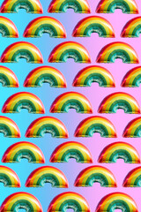 Rainbow balloons pattern on blue and pink background. Concept of lgbti.
