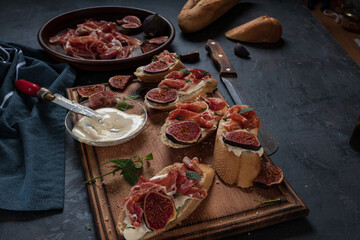 Tapas with ham and cream cheese.