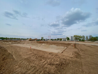 Large construction site. New construction site empty ground. The ground has been levelled and...
