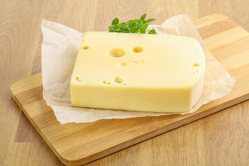 Maasdam cheese over the board