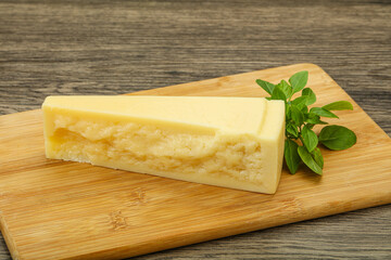 Hard parmesan cheese served basil