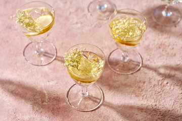 Glasses of lemonade with fresh elder flowers