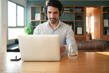 Man on a work video call from home.