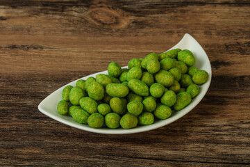 Spicy wasabi peanuts in the bowl