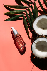 coconut face serum on colored background 