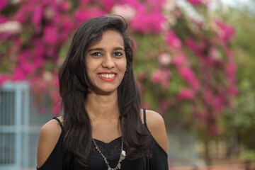 Beautiful young girl posing in a park, Portrait