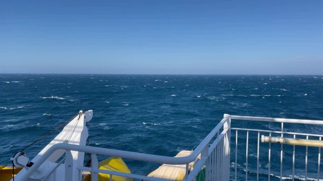 the ferry crossing the north sea between norway and denmark on open waters on a summer day
