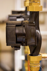 Water pump mounted on the pipe.