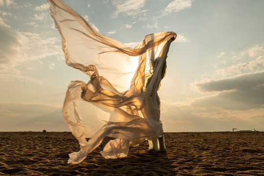 woman wrapped with nylon sheet
