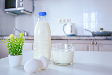 organic white dairy farm protein products on the kitchen table